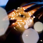 Girl puts led lights around her eye